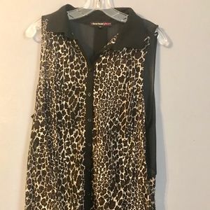 Cheetah print blouse with with black collar.